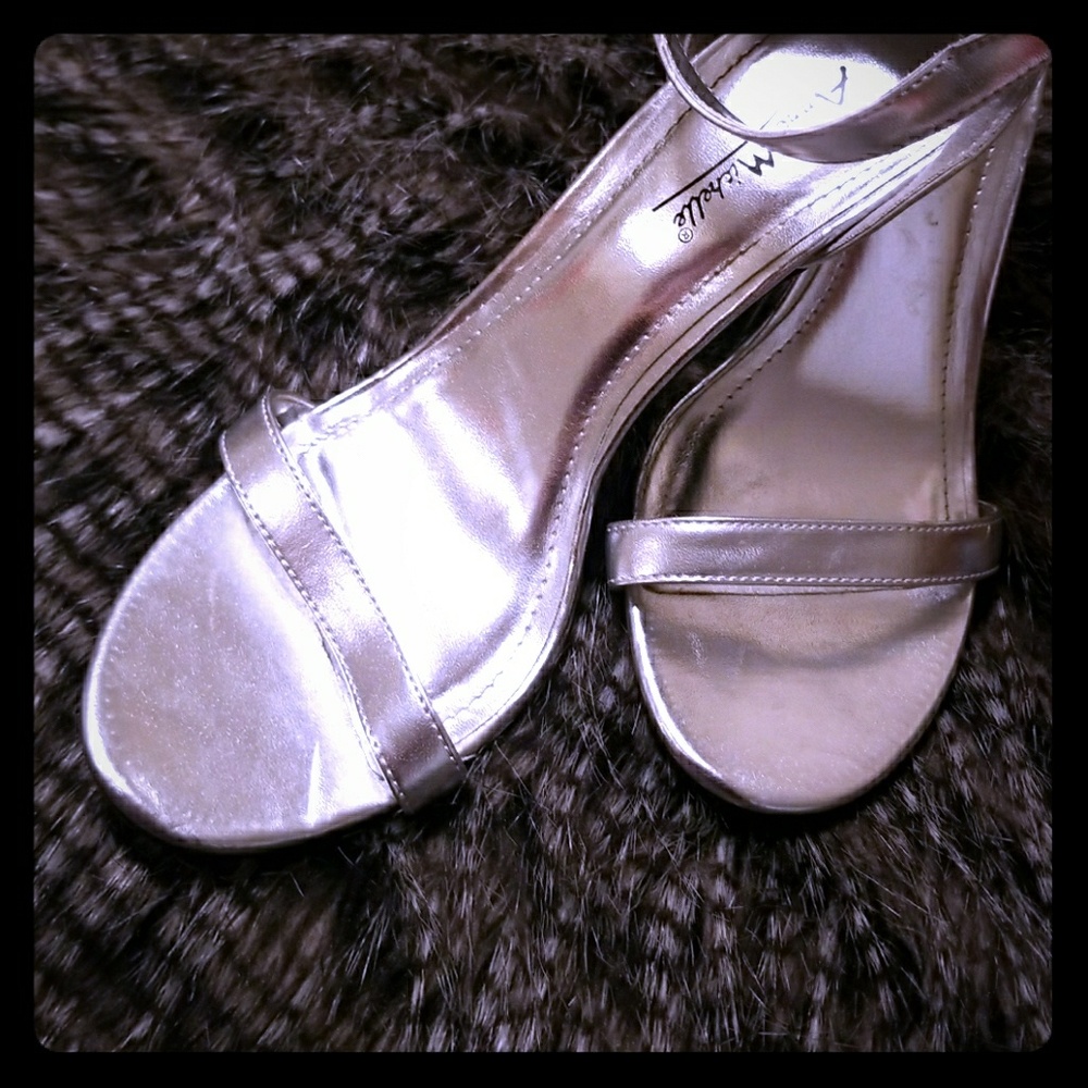 Strappy silver pumps